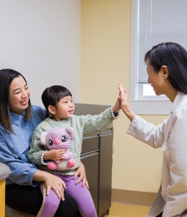 Doctor high-fiving patient