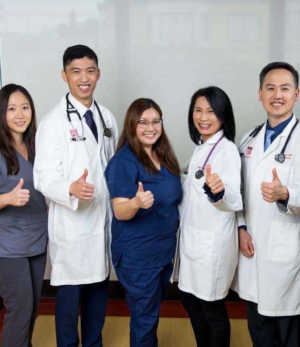 Doctors giving thumbs up