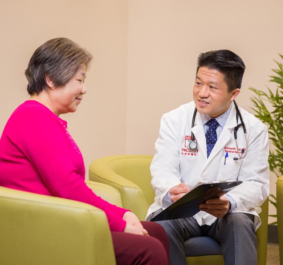 Doctor speaking with patient